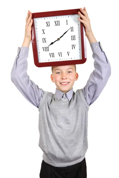 Niño con reloj grande — Foto de Stock