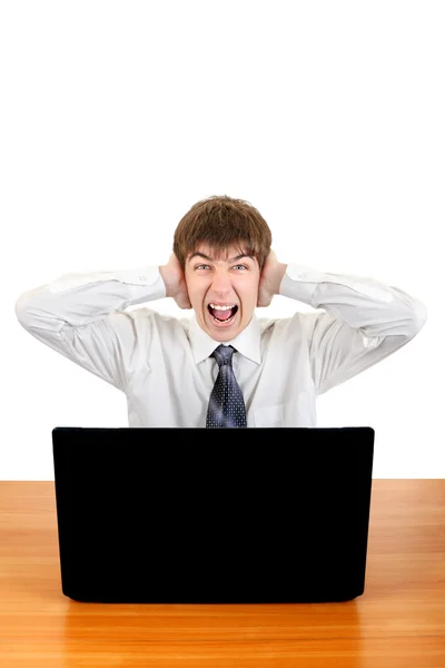 Adolescente nervioso con computadora portátil — Foto de Stock