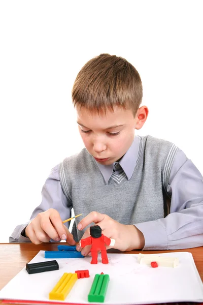 Menino brincando com Plasticina — Fotografia de Stock