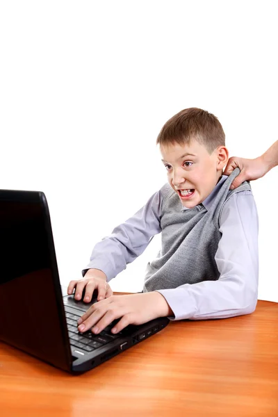 Parent dragging Son from Laptop — Stock Photo, Image