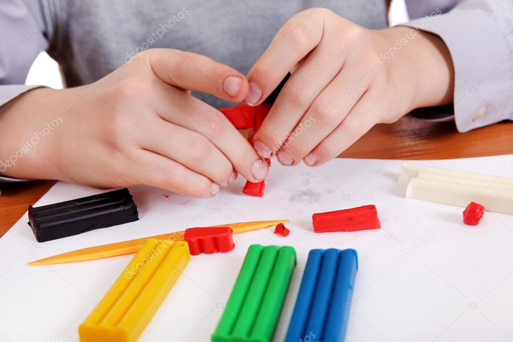 Boy Playing with Plasticine