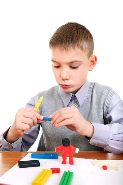 Chlapce hrát si s plastelínou — Stockfoto