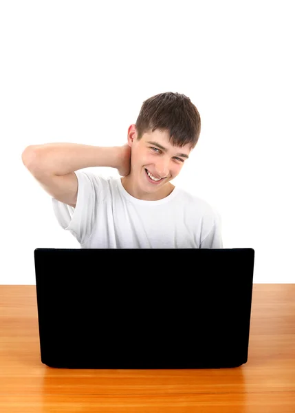 Laptop arkasında genç — Stok fotoğraf