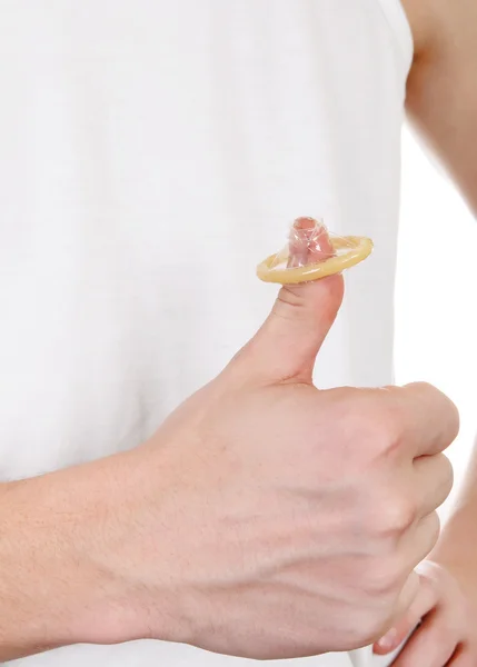 Презерватив на великого пальця — стокове фото