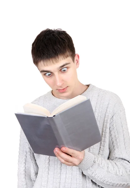 Surpreendido adolescente com um livro — Fotografia de Stock