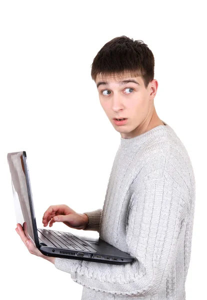 Adolescente assustado com laptop — Fotografia de Stock