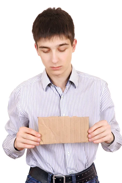 Adolescente triste com papelão em branco — Fotografia de Stock