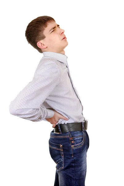 Подросток чувствует боль в спине — стоковое фото