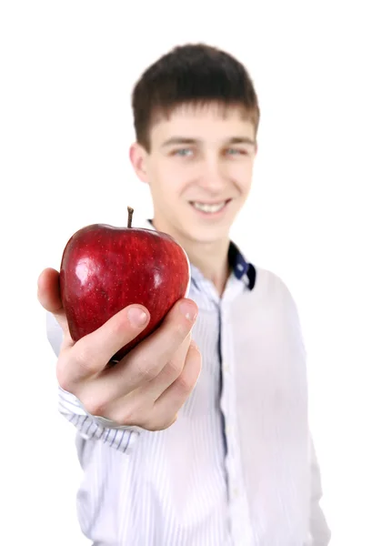 Teenager giving an Apple — Stock Photo, Image