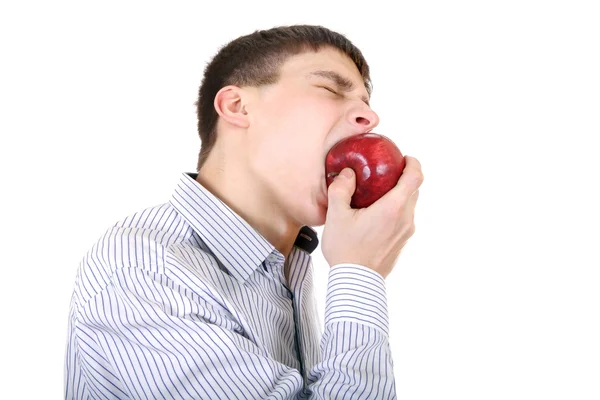 Teenager eats an Apple — Stock Photo, Image