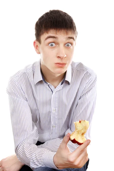 Teenager mit einem Apfel überrascht — Stockfoto