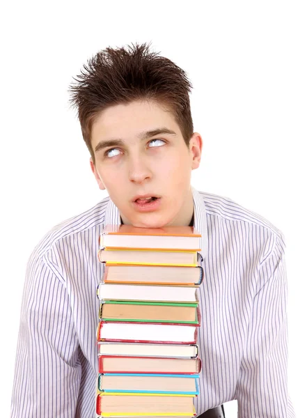 Irriterad tonåring med böcker — Stockfoto