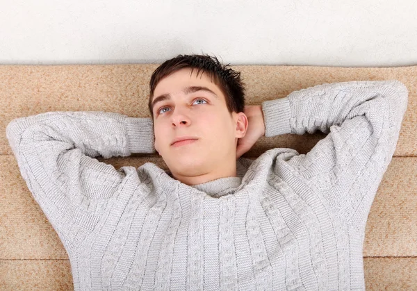 Teenager resting on Sofa — Stock Photo, Image