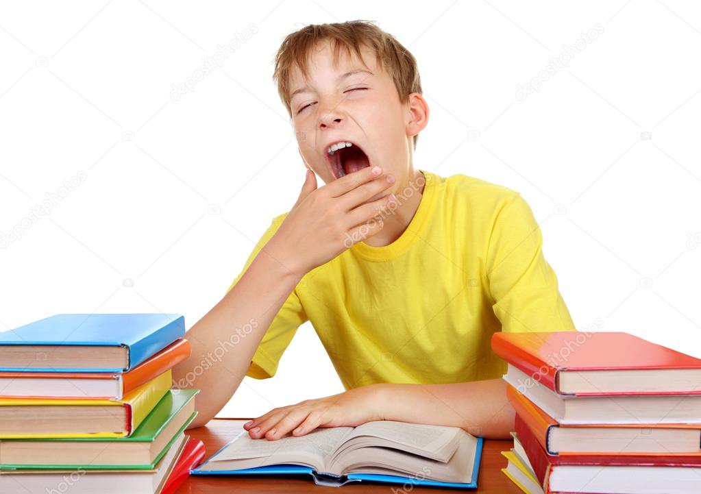 Tired Schoolboy yawning