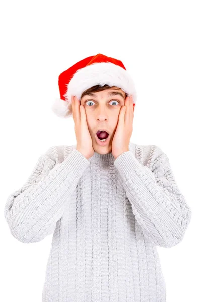 Überraschte Junge Mann Mit Weihnachtsmütze Isoliert Auf Dem Weißen Hintergrund — Stockfoto