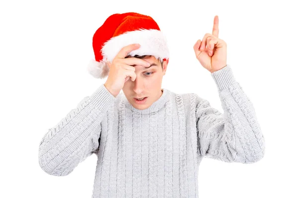 Ung Man Santa Hatt Med Finger Gesture Den Vita Närbild — Stockfoto