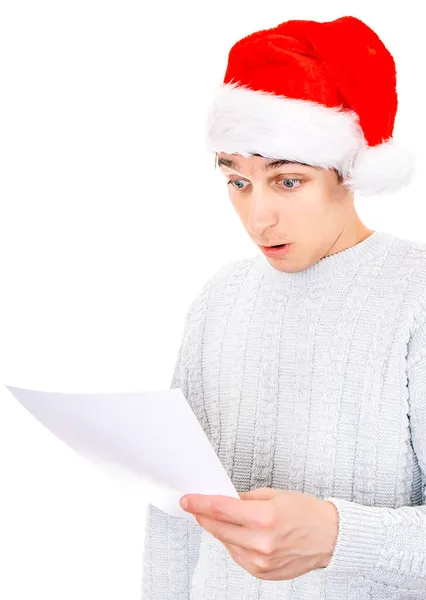 Unhappy Young Man Santa Hat Read Document Isolated White Background — Stock Photo, Image