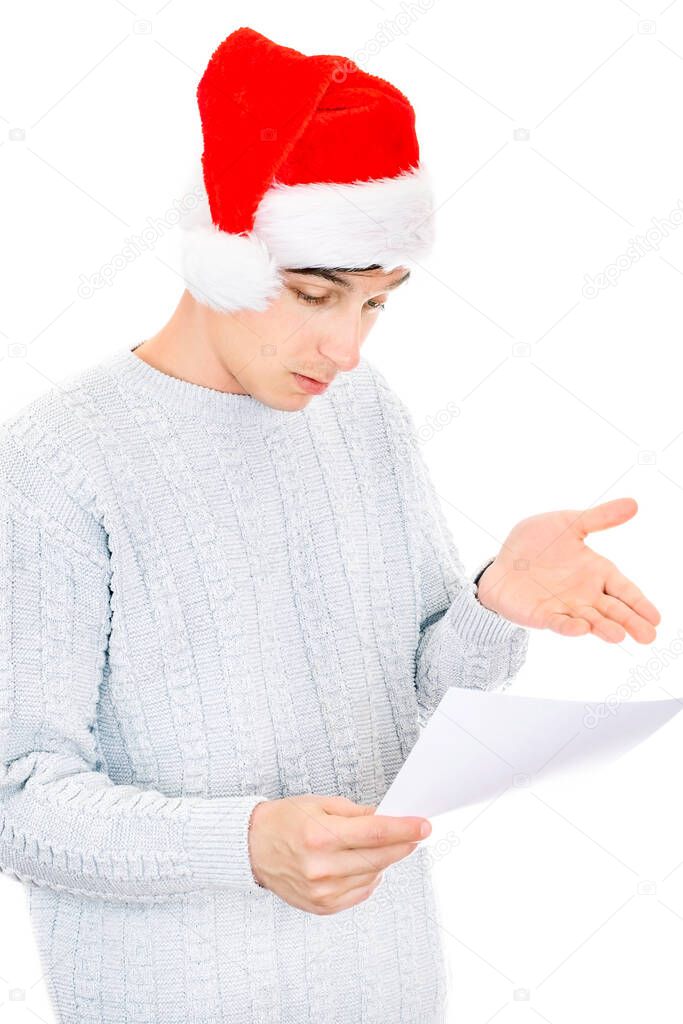 Young Man in Santa Hat read a Document Isolated on The White Background