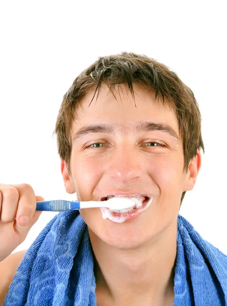Happy Young Man Szczotkuje Zęby Białym Tle Zbliżenie — Zdjęcie stockowe
