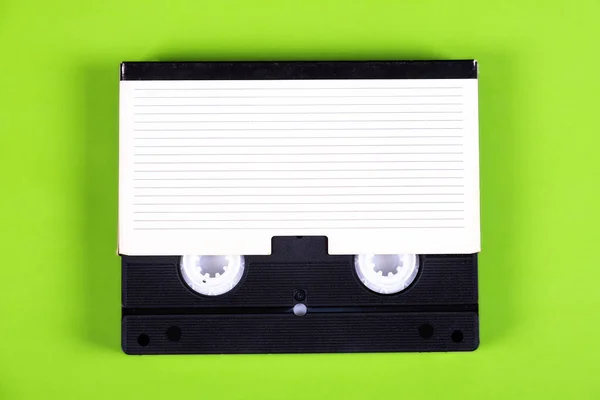 Retro Videoband Kassett Med Låda Grönbok Bakgrund — Stockfoto