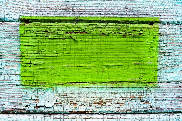 風化の青と緑の塗料で古い木製の板 — ストック写真