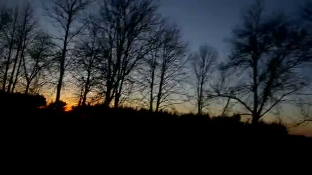 Захід сонця з вікна автомобіля — стокове відео