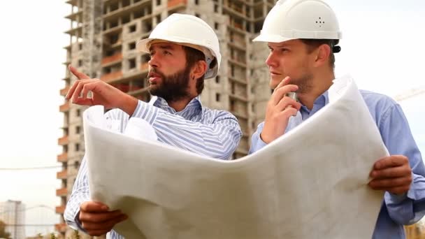 Ingénieurs en construction sur le chantier — Video