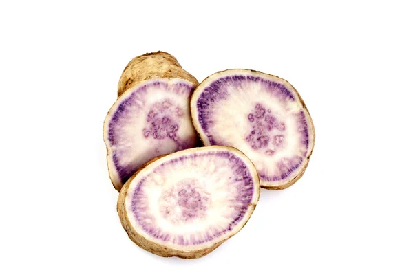 Фиолетовый сладкий картофель — стоковое фото