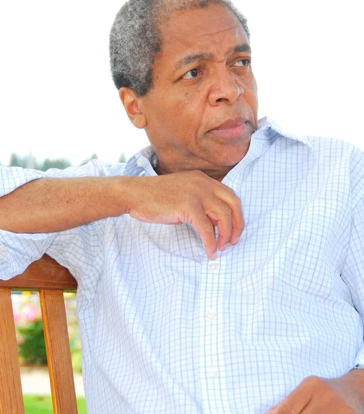 African American Male Senior Expressions Relaxing Outdoors — Stockfoto