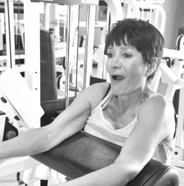 Mature Female Senior Working Out Health Club — Stock Photo, Image