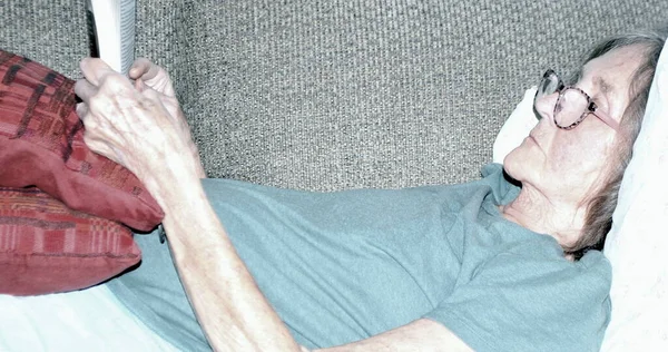 Mature Female Senior Relaxing Sofa Indoors —  Fotos de Stock