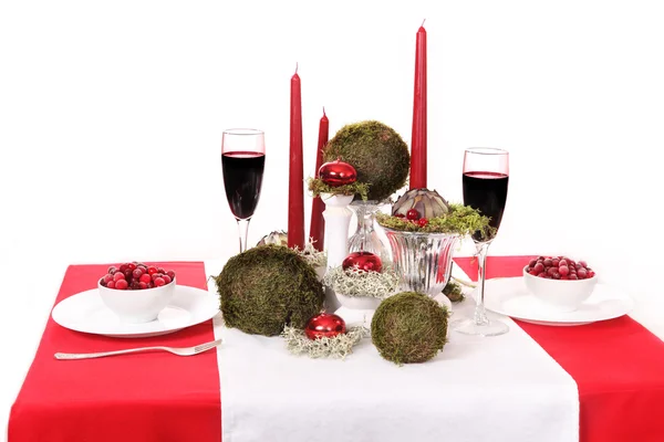 Beyaz, yeşil ve kırmızı düzeni mumlarla masa dekorasyonu — Stok fotoğraf