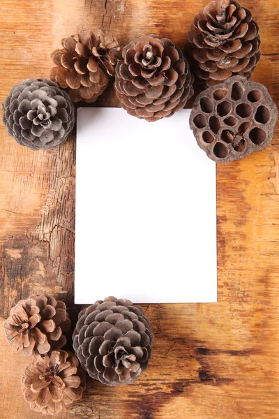 Blank white sheet, surrounded by cones — Stock Photo, Image