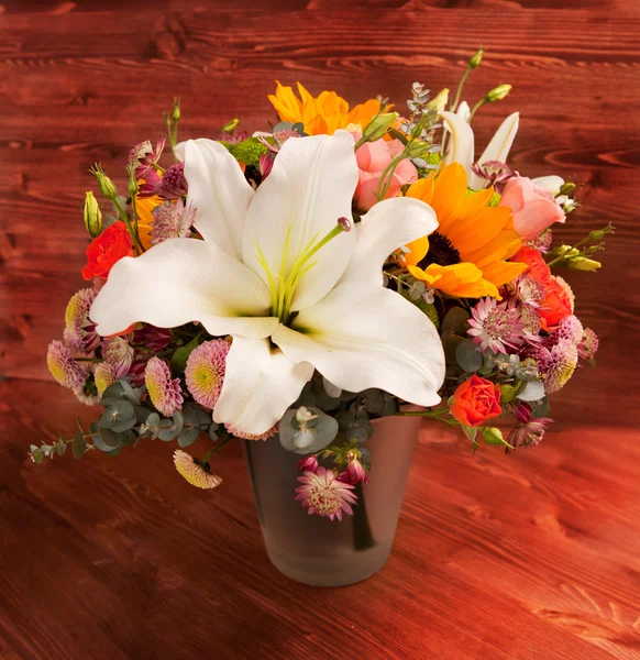 floral bouquet with lily, sunflower, chrysanthemum, eustoma (lis