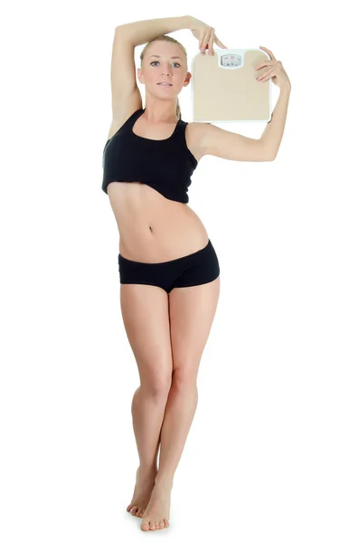Izole üzerinde beyaz arka plan ile spor kız ölçekler — Stok fotoğraf