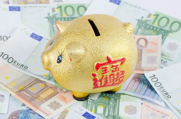 Piggy bank on banknotes from euro — Stock Photo, Image