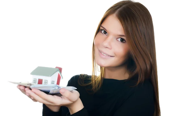 La mujer con la casa de juguetes y los billetes — Foto de Stock