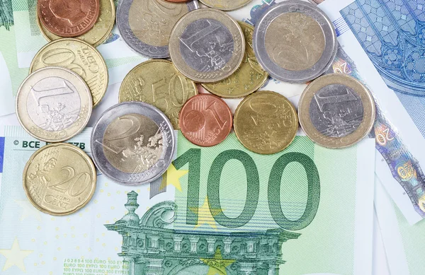 Various Euro currency bills and coins — Stock Photo, Image