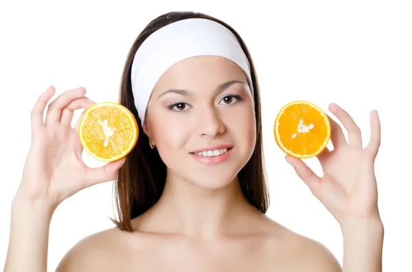 The beautiful woman with a orange — Stock Photo, Image