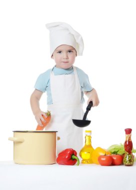 aşçı şapkalı küçük çocuk