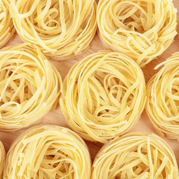 Nyers tészta spagetti, makaróni — Stock Fotó