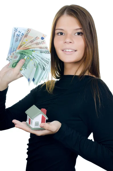 The business woman with the toy house and banknotes — Stock Photo, Image