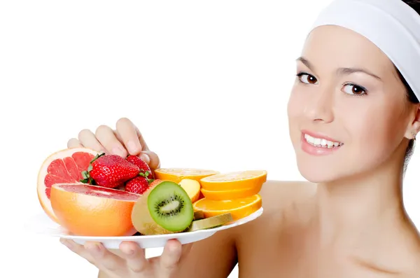 The beautiful woman with fruit — Stock Photo, Image