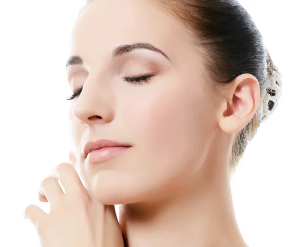 The beautiful woman. A photo of the beautiful woman with a natural make-up. Care of a skin. Spa — Stock Photo, Image