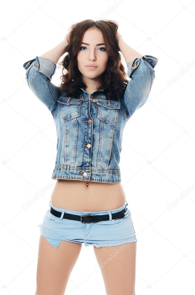 The beautiful woman in jeans shorts