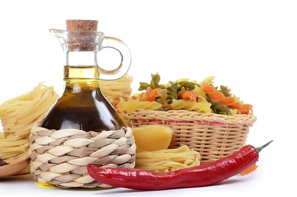 Pasta with an olive oil isolated on white background — Stock Photo, Image