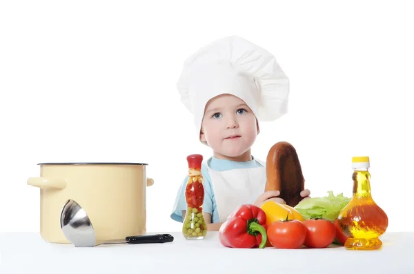 Le petit garçon dans un chapeau du cuisinier — Photo