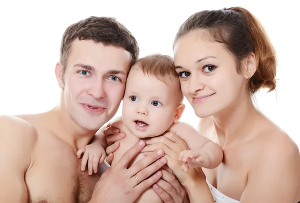 Retrato de uma jovem família feliz com a criança — Fotografia de Stock