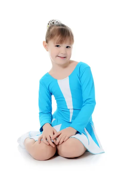 Petite fille la gymnaste fait de l'exercice — Photo