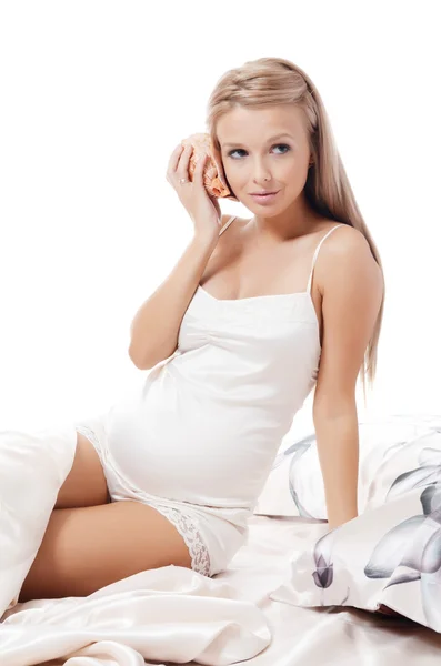 The beautiful pregnant woman with a cockleshell — Stock Photo, Image